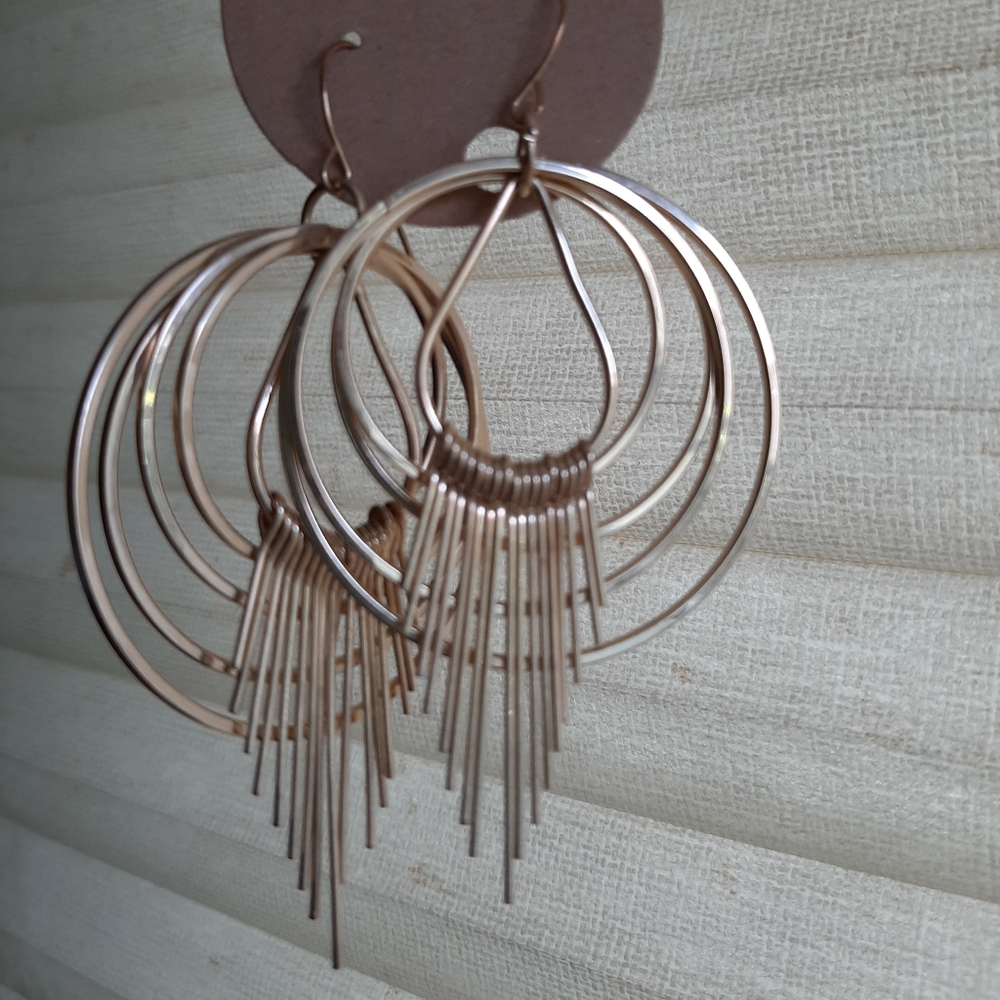 Gold Chandelier Earrings with Orbital Design and Fringe